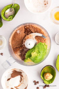 ingredients for avocado chocolate mousse in the food processor.