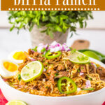 Slow cooker Birria Ramen in a bowl, ready to serve. Pinnable image.