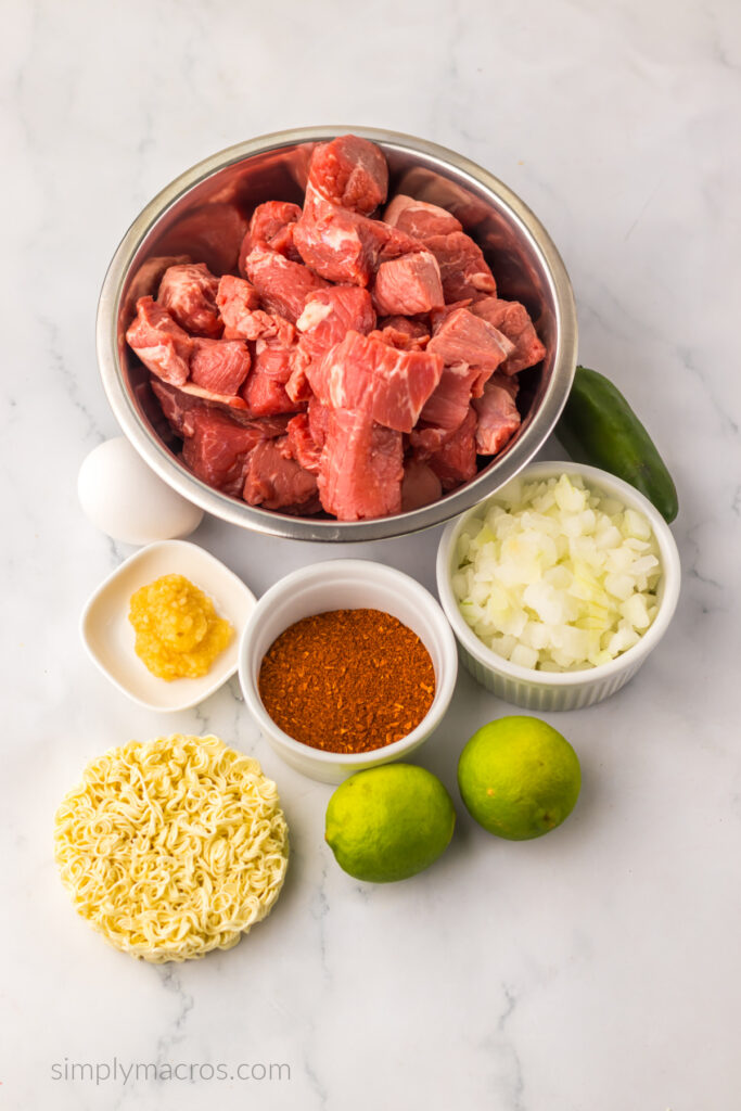 Ingredients needed for the Barria ramen bowl, on a white table top. 