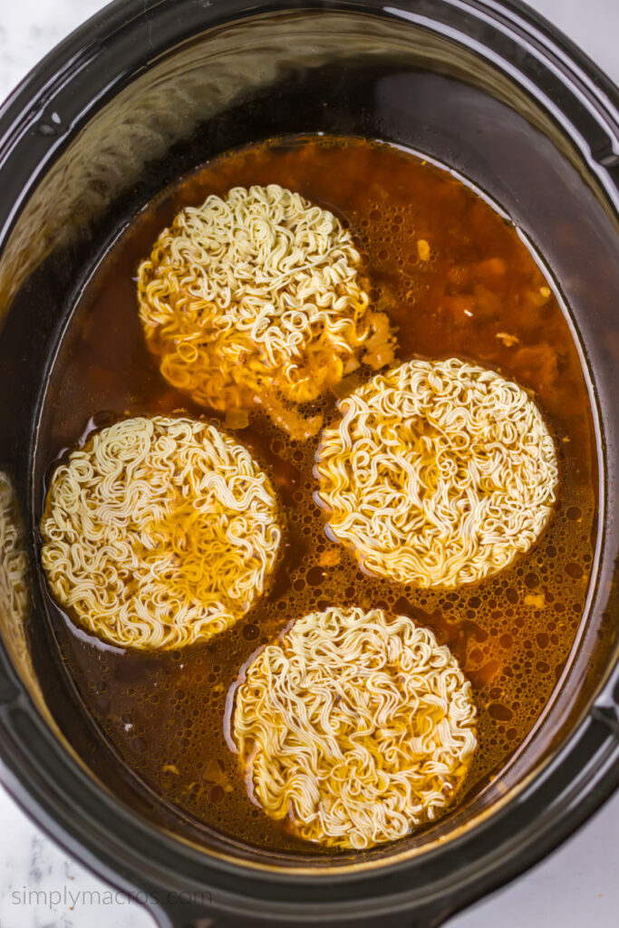 Ramen noodles added to the broth for the Birria bowl. 