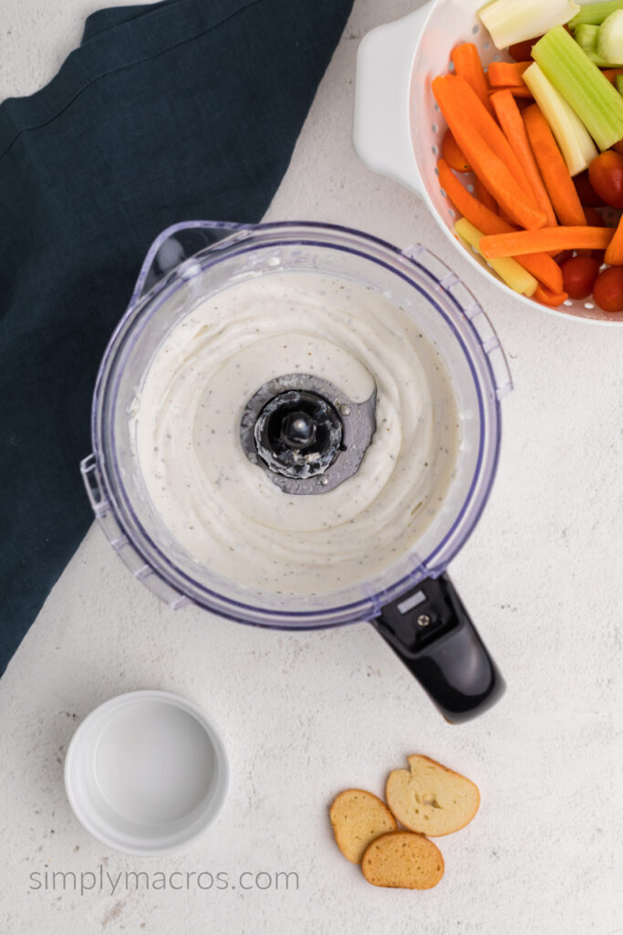 Cottage cheese and ranch seasoning packet blended together until smooth in a food processor.