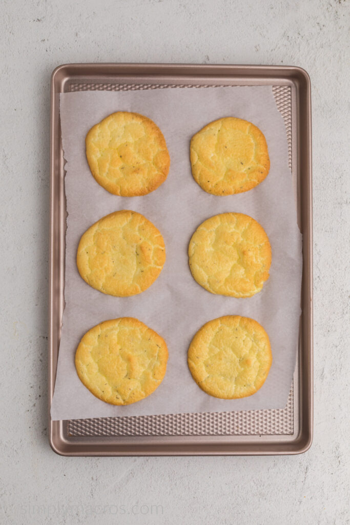 Lined baking sheet with baked cloud bread, ready to serve. 