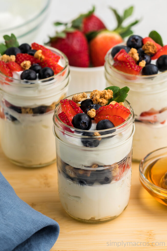 Greek Yogurt Parfaits in jars ready to eat. 