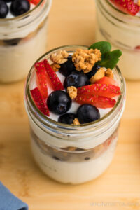 greek yogurt parfait layered with berries.