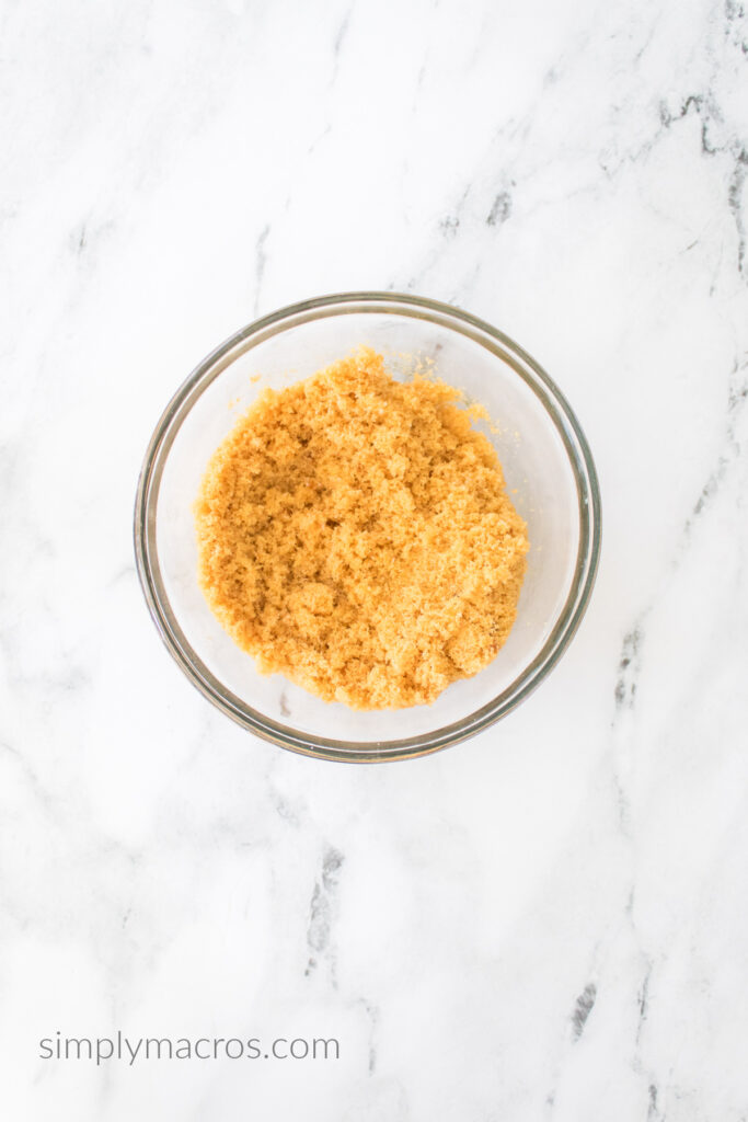 Brown sugar in a mixing bowl made out of granulated white sugar and molasses. 