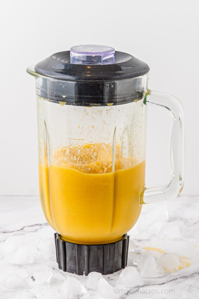 Ingredients for the Mango A Go Go are fully blended in the blender and ready to serve.