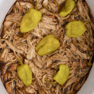 Mississippi Chicken in the bottom of the slow cooker, ready to serve.