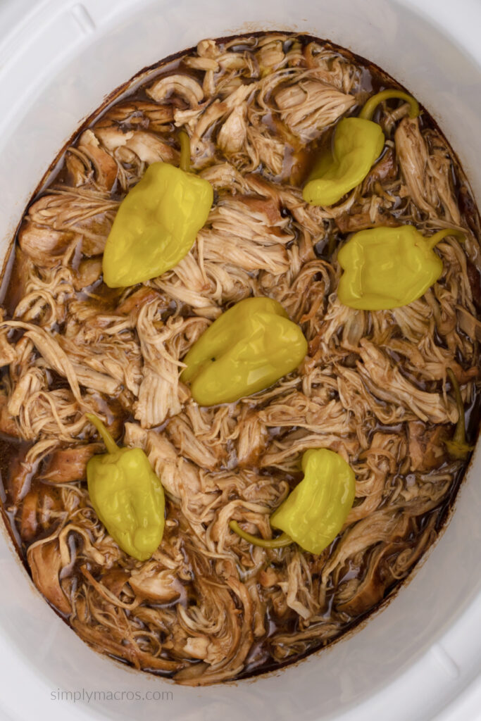 Mississippi Chicken in the bottom of the slow cooker, ready to serve.