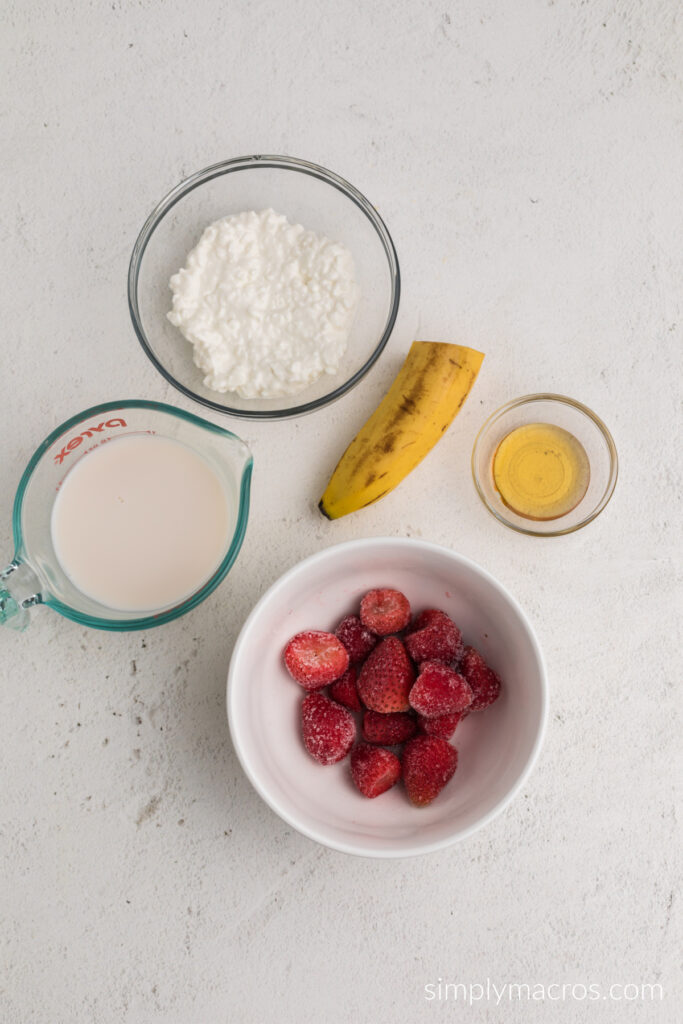 Ingredients needed for strawberry  cottage cheese smoothies.