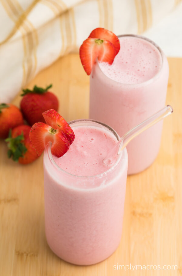 Strawberry cottage cheese smoothies on a board, ready to serve.