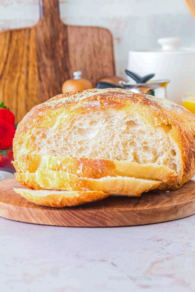 Sourdough bread sliced open and served on a cutting board. 