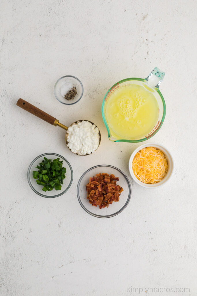 Ingredients needed to make egg white bites on a white table.