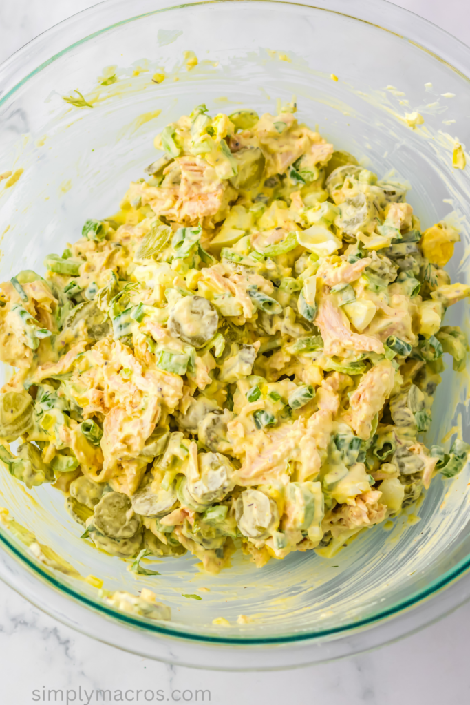Dill pickle chicken salad in a bowl, ready to scoop and serve.