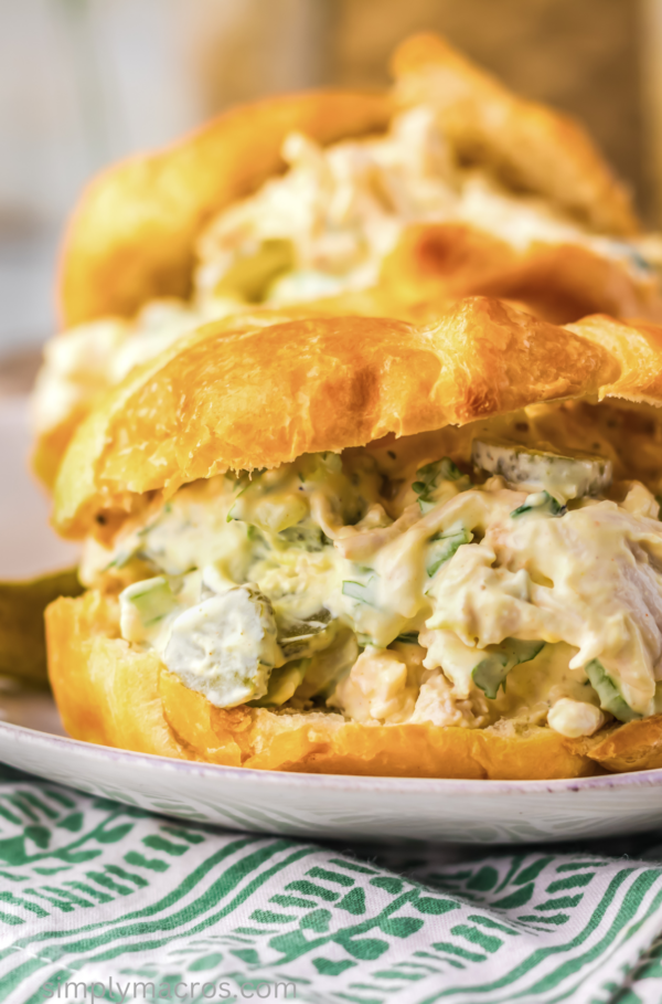dill pickle chicken salad on a croissant, ready to serve.