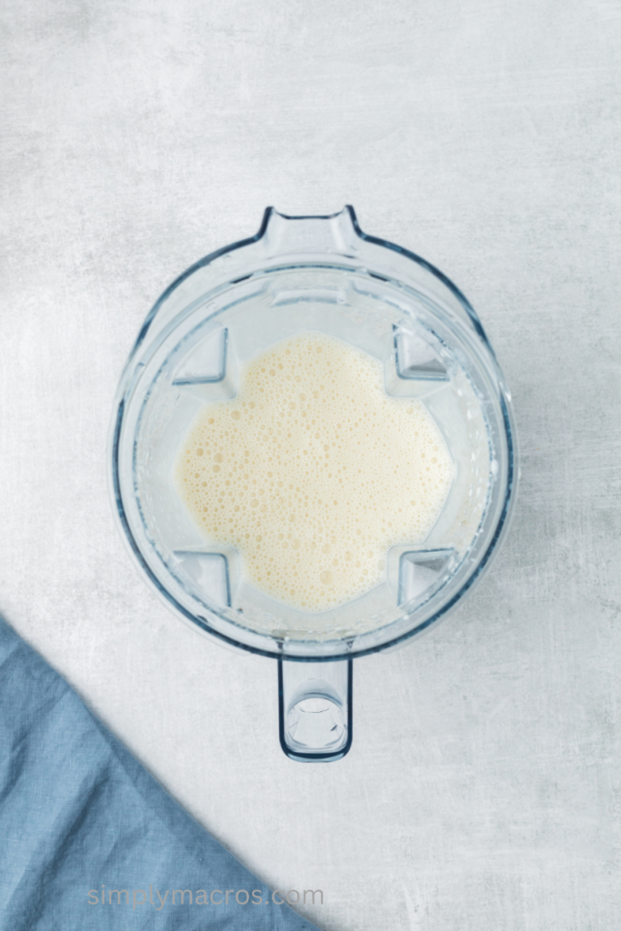 Ingredients in the base of the blender, fully blended and ready to pour.