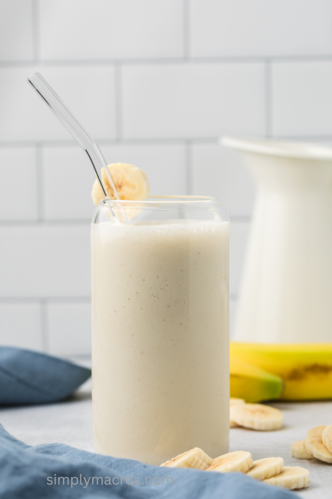 Banana smoothie in a glass, ready to drink. 