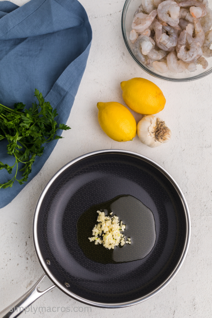 Minced garlic and olive oil in a skillet.