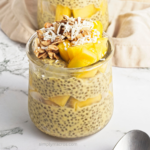 Mango Coconut CHia Pudding in a jar, ready to serve.