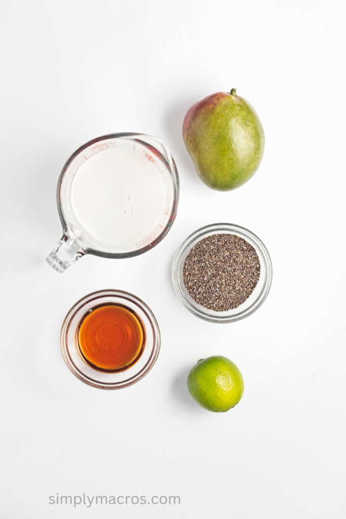 Ingredients on a table top needed to make chia seed pudding with mango.