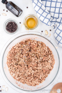 granola ingredients combined and ready to bake.