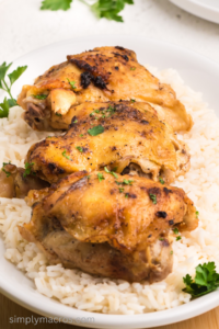 chicken thighs over rice.