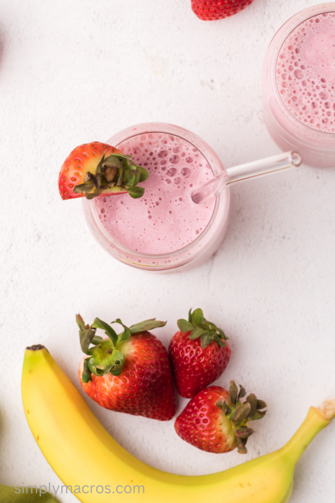 Overhead photo of a strawberry banana smoothie, ready to drink. 