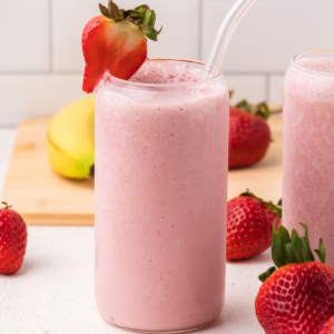Strawberry Banana Smoothie in a glass, ready to drink.