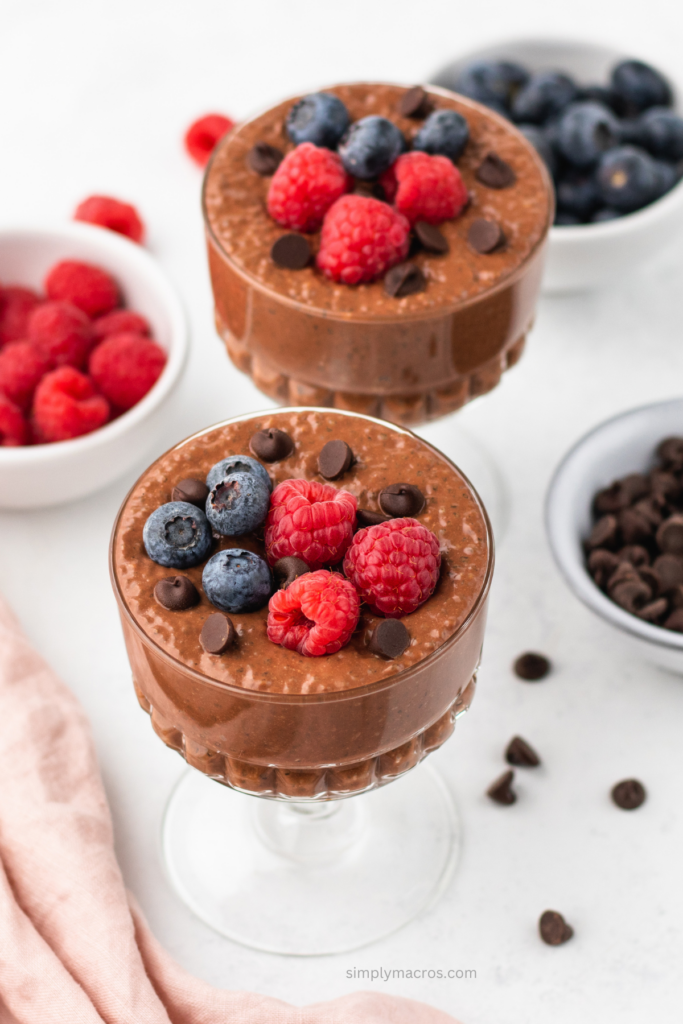 Chocolate chia pudding topped with fresh berries and chocolate chips before serving. 