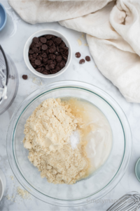 Ingredients for cottage cheese cookies added to a large bowl.