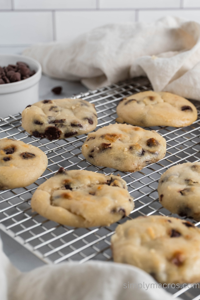 Baked chocolate chip cottage cheese cookies cooling on a wire rack. 