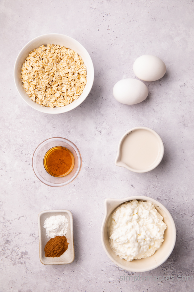 Ingredients separated on a table that are used to make pancakes with cottage cheese. 
