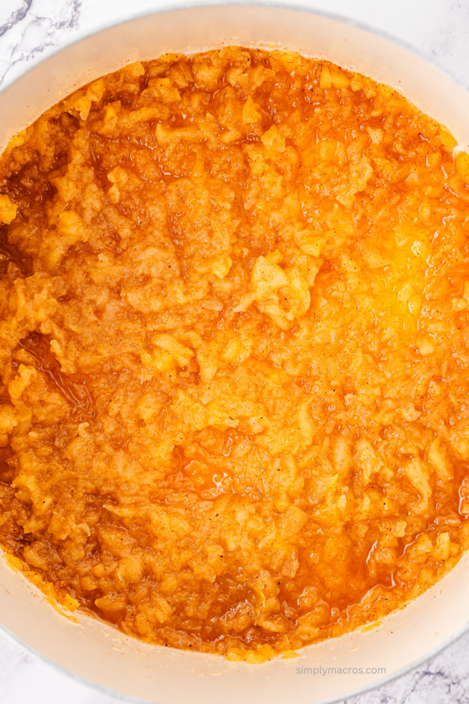Mashed apples in saucepan, ready to serve.