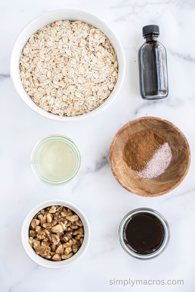 Ingredients separated out on a table top that are needed to make cinnamon vanilla granola. 