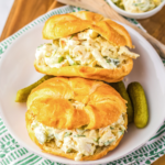 Overhead picture of dill pickle chicken salad on croissants.