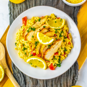 Overhead photo of lemon chicken orzo on a plate and ready to serve.