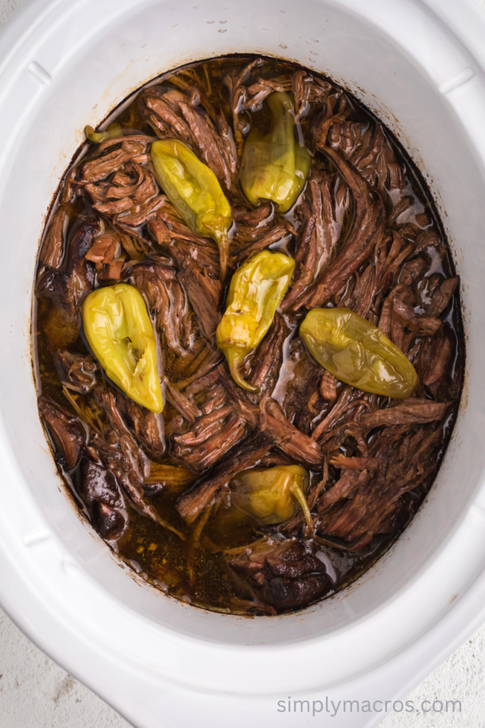 Overhead photo of a Mississippi pot roast in the slow cooker. 