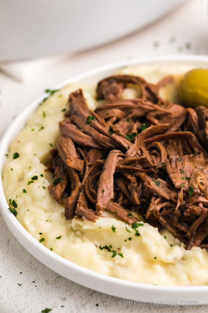 Mississippi pot roast shredded and topped over mashed potatoes. 