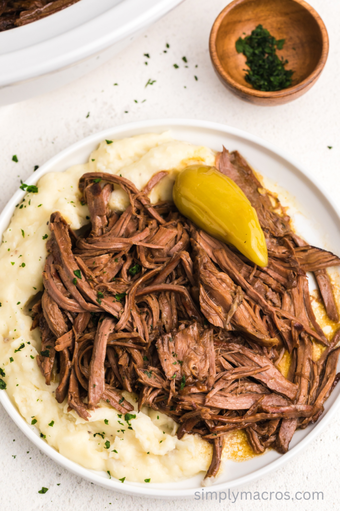 Shredded pot roast over mashed potatoes. 
