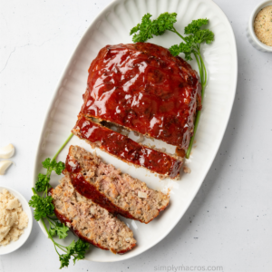 Air fryer turkey meatloaf sliced and on a serving platter.