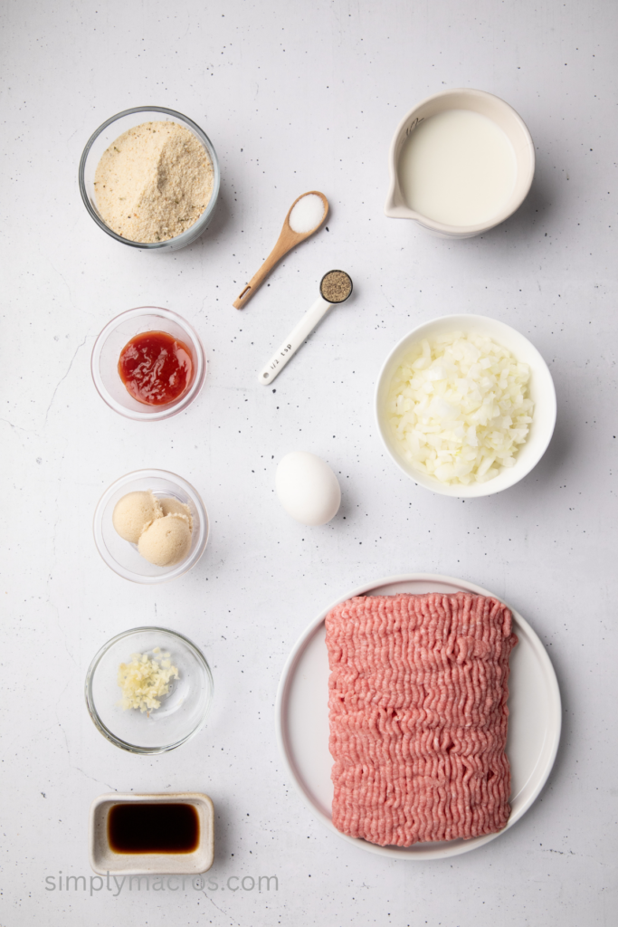 Ingredients on a table top that are used to make turkey meatloaf. 