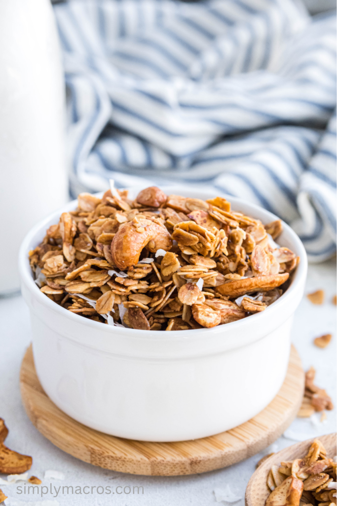 Close up of cashew coconut granola in a container for serving. 