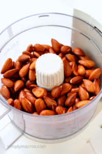 almonds in the bottom of a food processor.