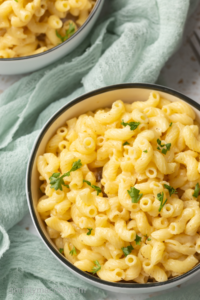 Cottage cheese mac and cheese garnished with fresh parsley.
