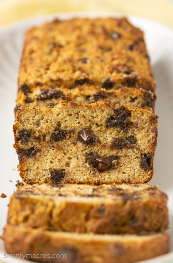Head on close up of sliced protein banana bread with chocolate chips.