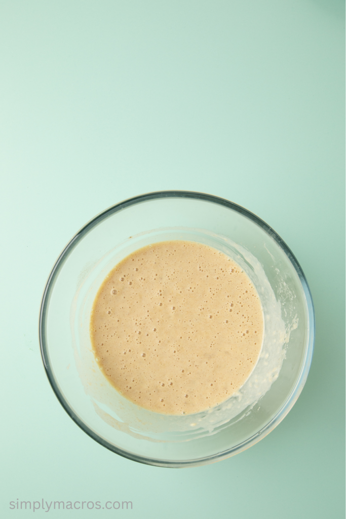 Wet ingredients for protein banana bread in a bowl.
