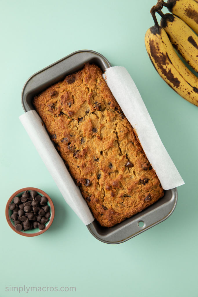 Overhead photo of fully cooked banana bread in a loaf pan. 