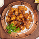 Overhead photo of air fryer chicken bites.