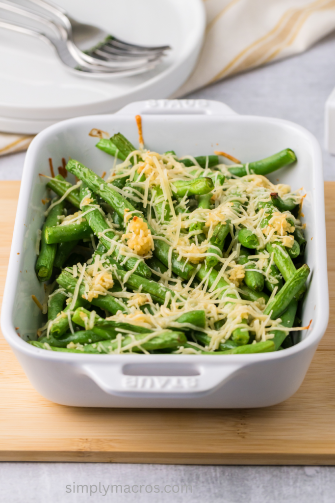 Picture of garlic parmesan green beans in a casserole dish, ready to eat. 