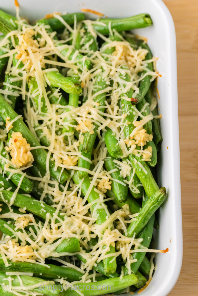 close up of garlic parmesan green beans in a casserole dish. 