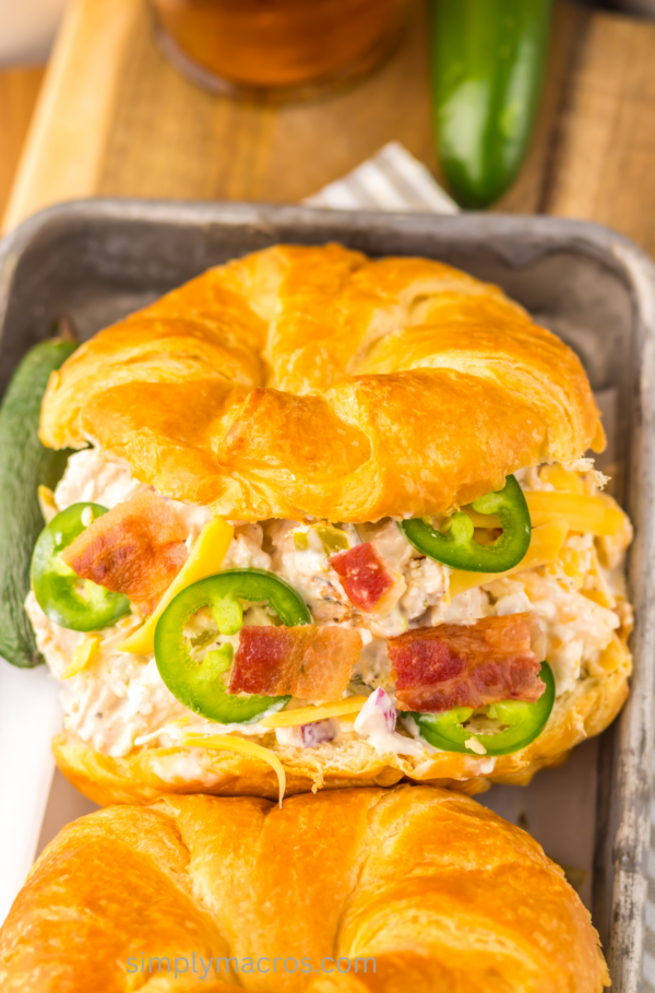 Jalapeno popper chicken salad sandwich on a tray ready to eat.